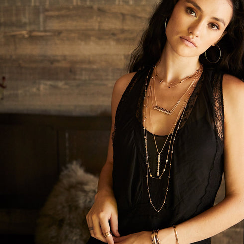 lovely with jewelry from<br>shop the look > it’s black and white <span class='visuallyhidden'>Contact the Beverly Hills store at 323-404-2959 or through this website for shopping assistance.</span>